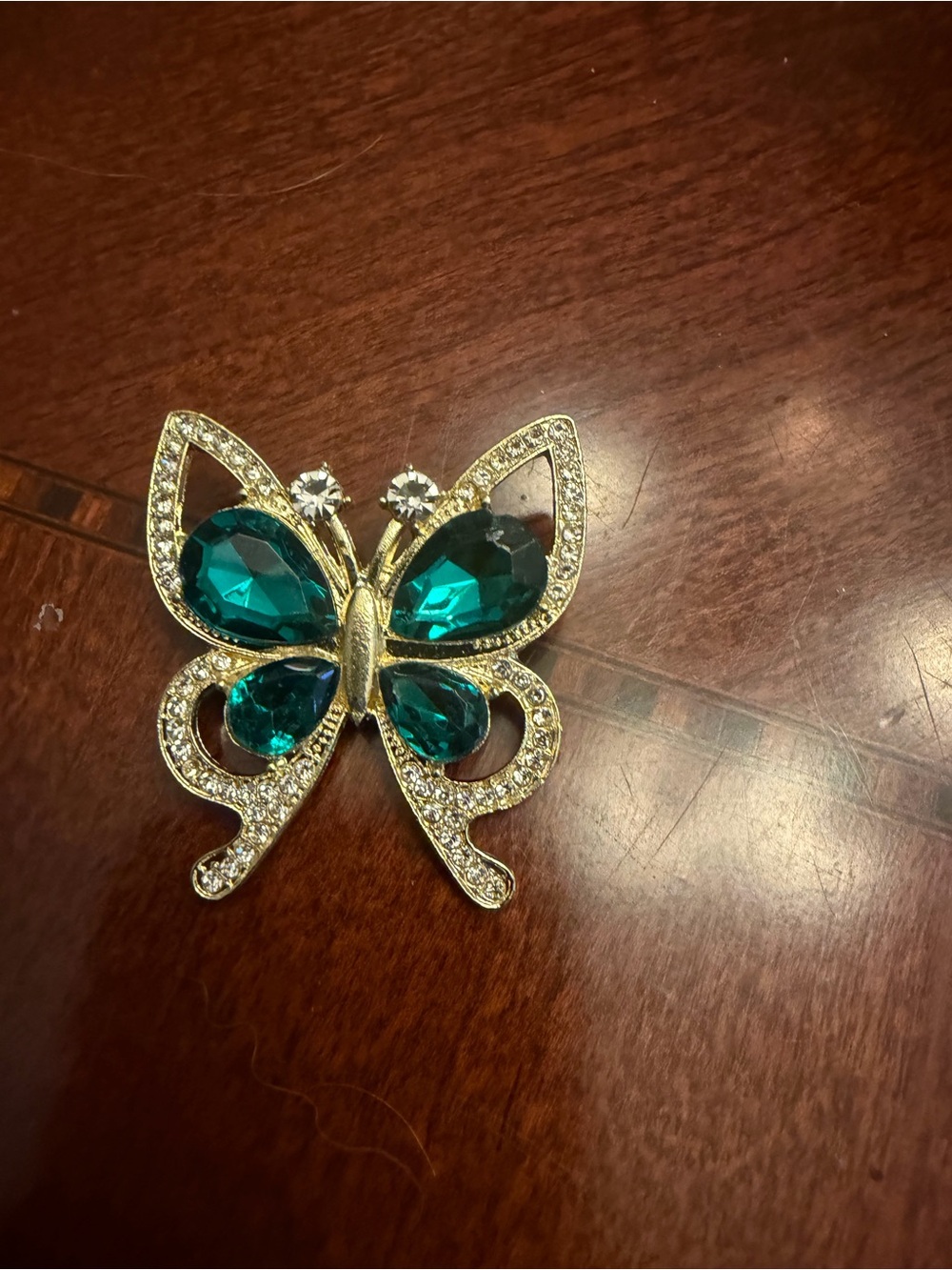Gold Butterfly Brooch with Teal Gemstones